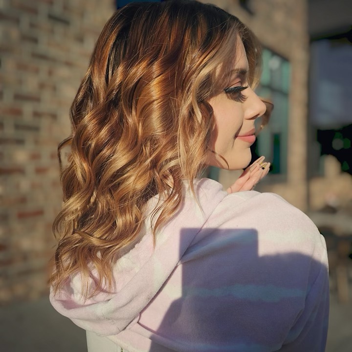 Glossy hair color finish at Dream Hair Artistry Salon